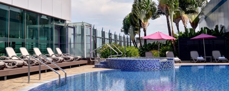 Soak up in the pool and Jacuzzi for a small price with a complimentary drink by your side - layover just became so awesome